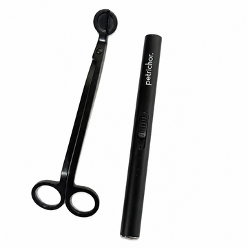 Black candle care set on a white background