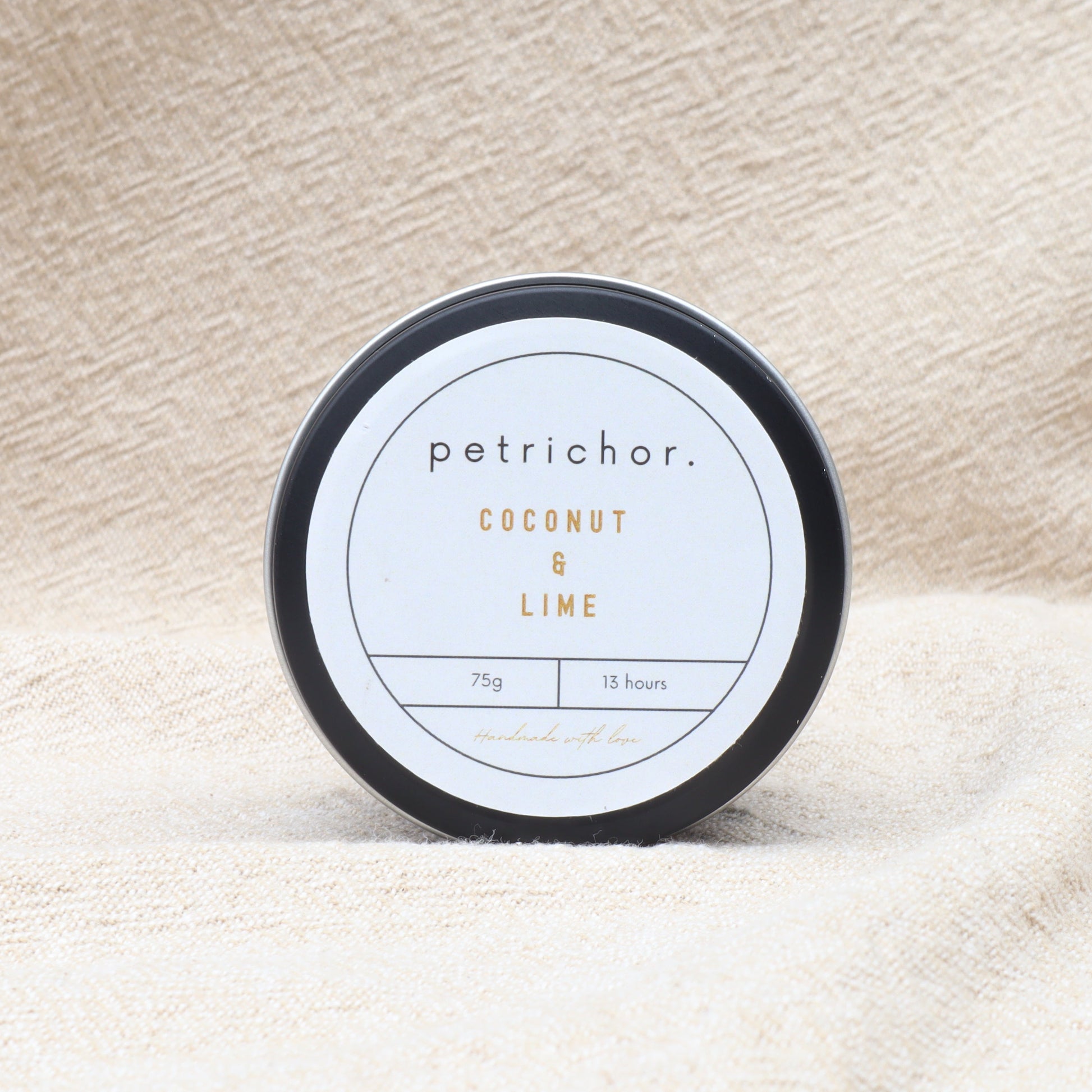 Petrichor coconut and lime product on a textured beige surface