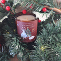 Sugarplum Feast Christmas candle among pine branches with red berries