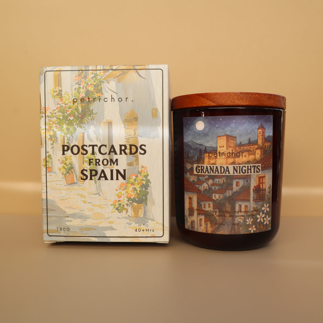 Candle with a decorative label featuring a castle and 'Granada Nights' text on a beige background.
