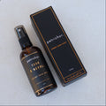 Petrichor bottle and packaging on a light gray background