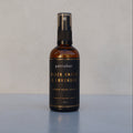 Bottle of petrichor Black Amber & Lavender on a light gray background